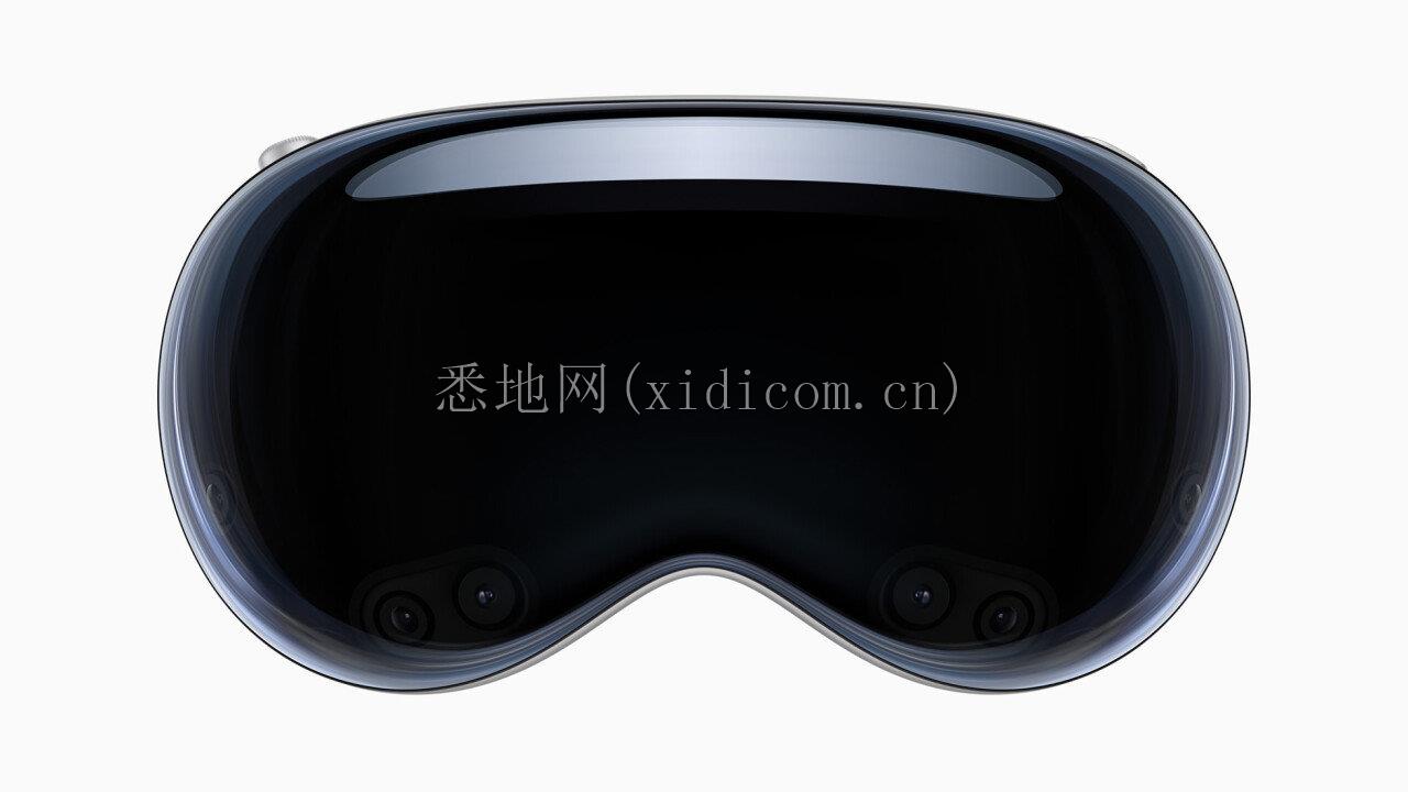 Apple-WWCD23-Vision-Pro-glass-230605_big.jpg.large_2x (1).jpg