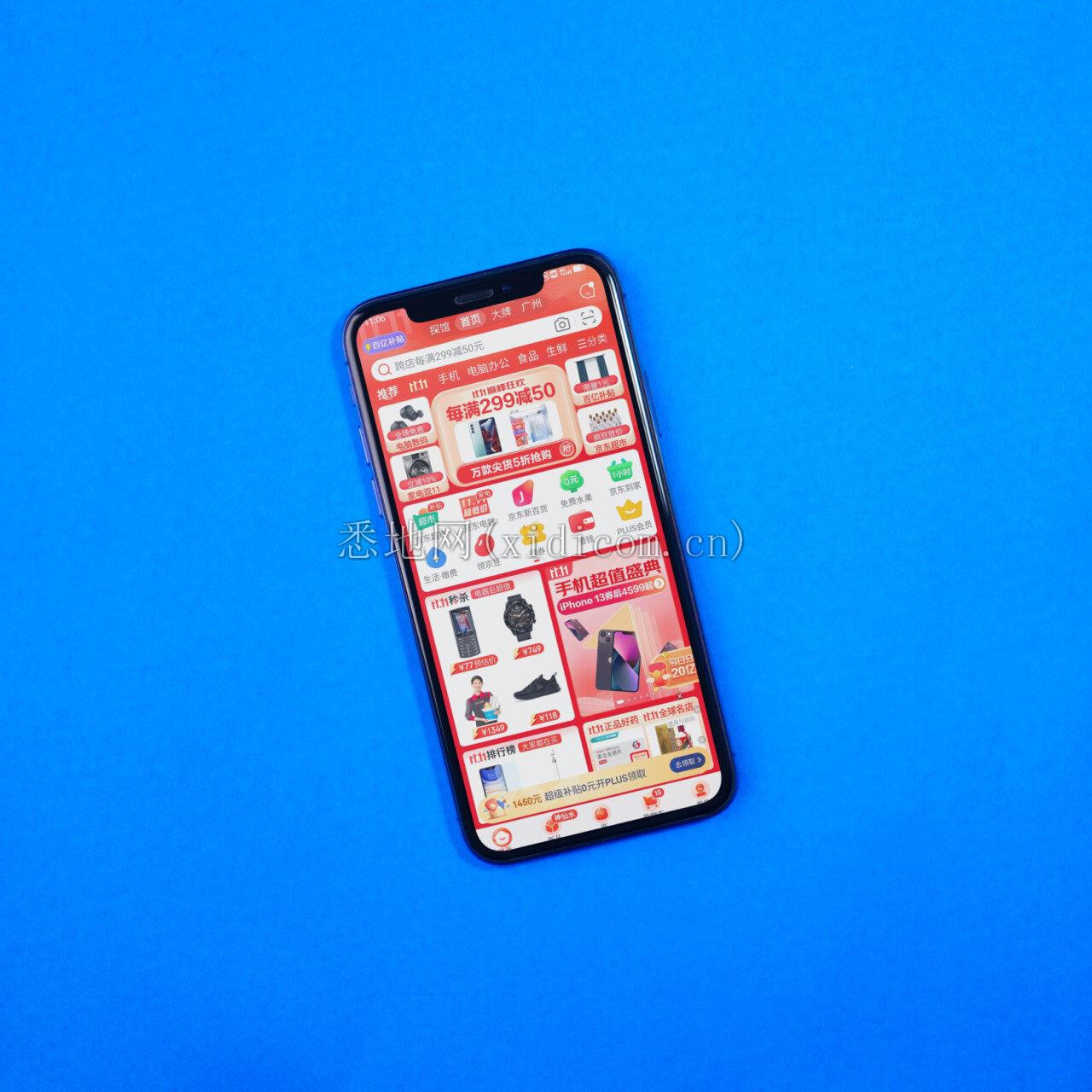 iPhone X on blue desk.jpg